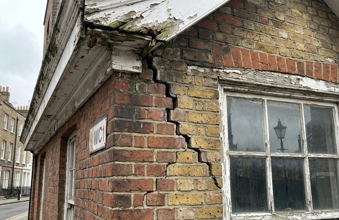 Chartered structural engineer carrying out a structural survey in London